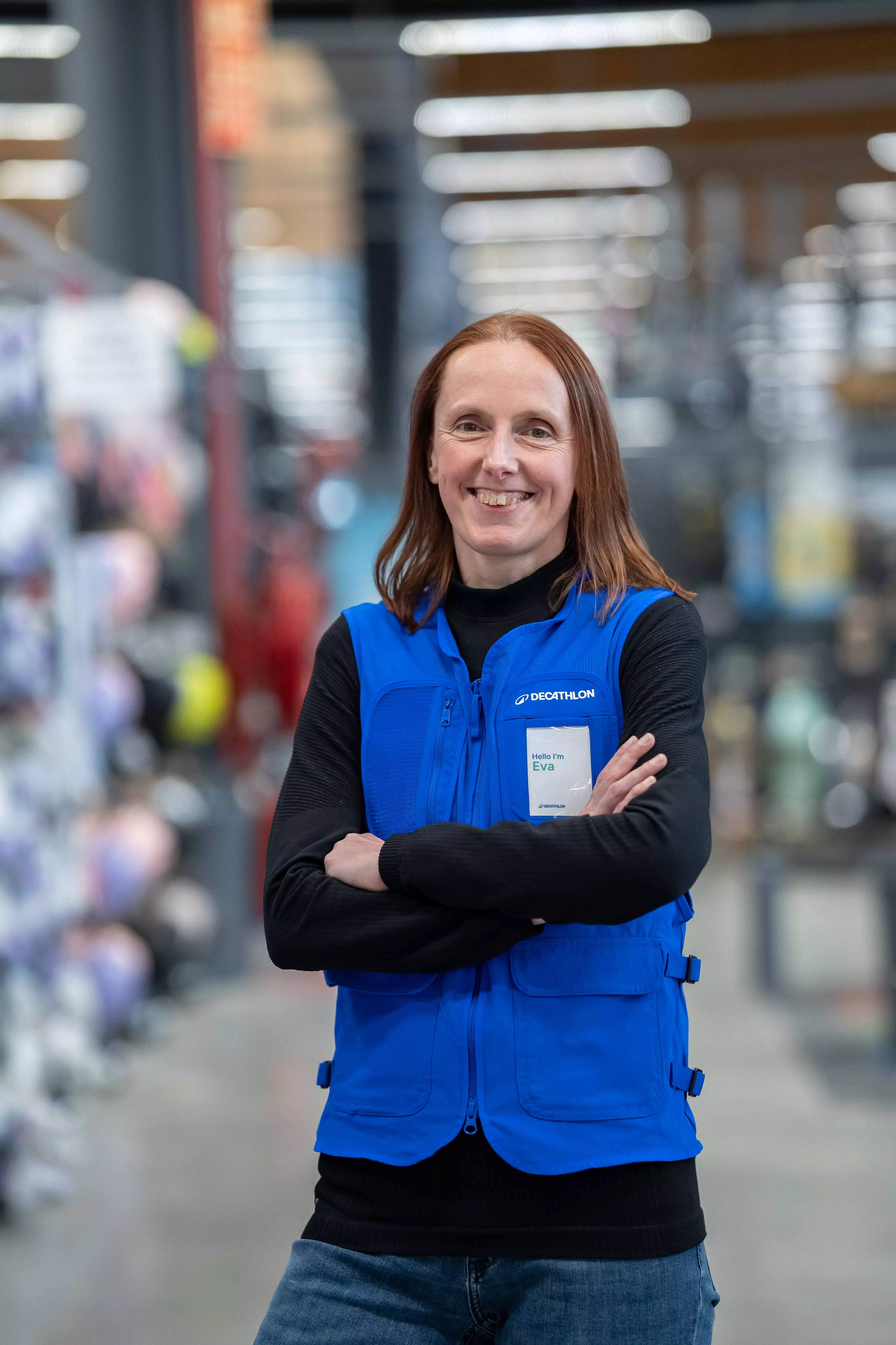 femme magasin sourire decathlon travail sport 